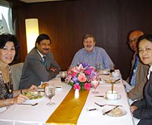 from Left Ms. Nanda Krairiksh. Dr. Nagesh Kumar, Dr. John Moon and Dr. Haishan Fu, all of the U.N